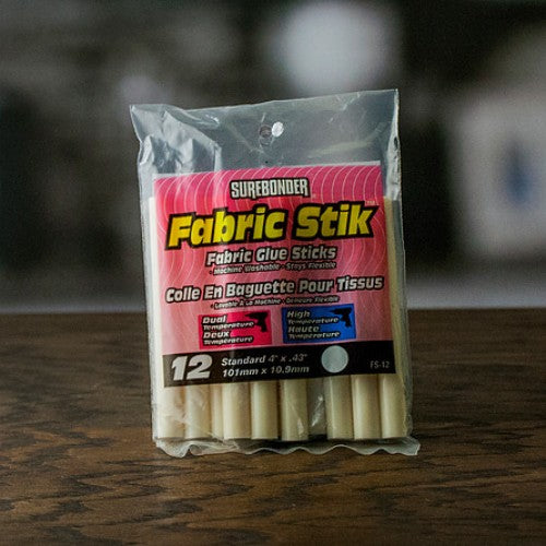 Surebonder Fabric Stik pack of 12, perfect for bonding various fabrics, machine washable and ideal for crafting projects.