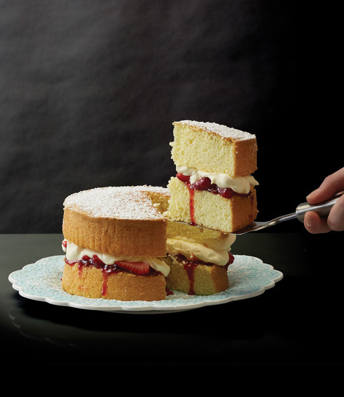 Carveasy Twin Blade Electric Knife by SUNBEAM, featuring dual blades for effortless slicing of meats, breads, and delicate foods.