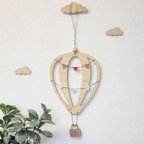 Colorful hot air balloon wall art kit made from 4mm pine veneer, perfect for children's rooms and nurseries.