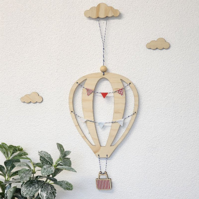 Colorful hot air balloon wall art kit made from 4mm pine veneer, perfect for children's rooms and nurseries.