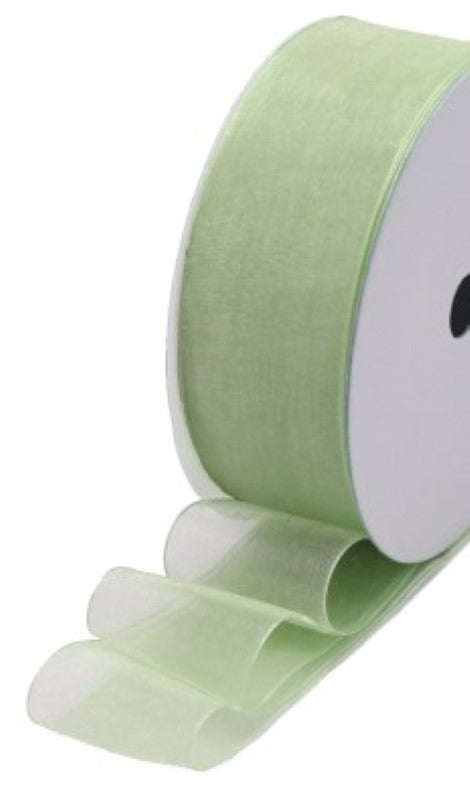 Soft mint organza ribbon roll, 25mm wide and 25m long, perfect for gift wrapping and decor accents.