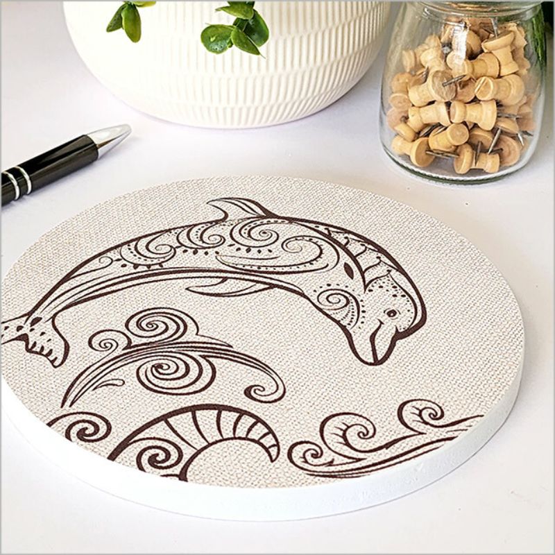 Circular canvas wall art featuring a vibrant dolphin design, ideal for marine enthusiasts and stylish home decor.