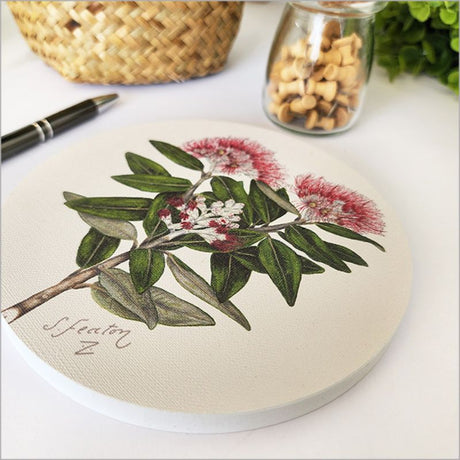 Beautiful canvas circle featuring the vibrant Pohutukawa tree, perfect for enhancing small spaces and adding natural elegance.