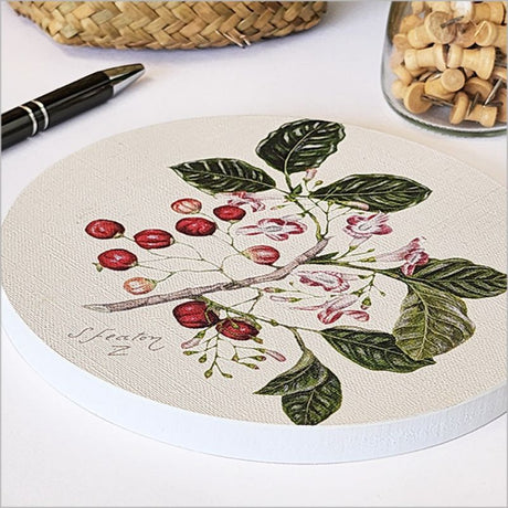 Embossed canvas circle wall art featuring vibrant Puriri foliage, perfect for modern decor, 15cm in diameter.