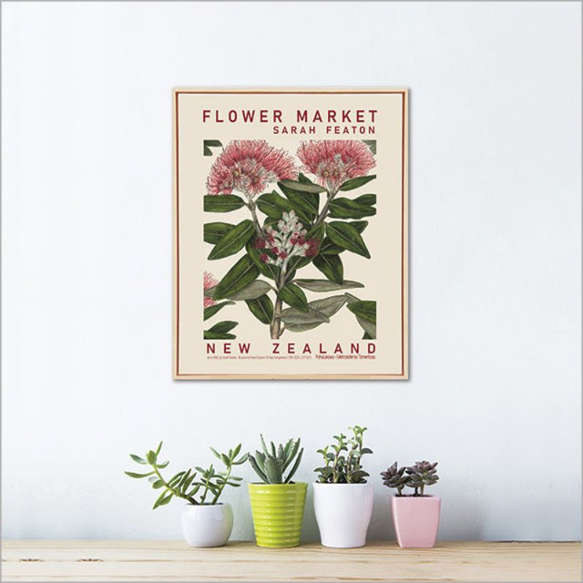 Framed canvas wall art featuring vibrant Pohutukawa blossoms by Sarah Featon, perfect for enhancing your home decor.