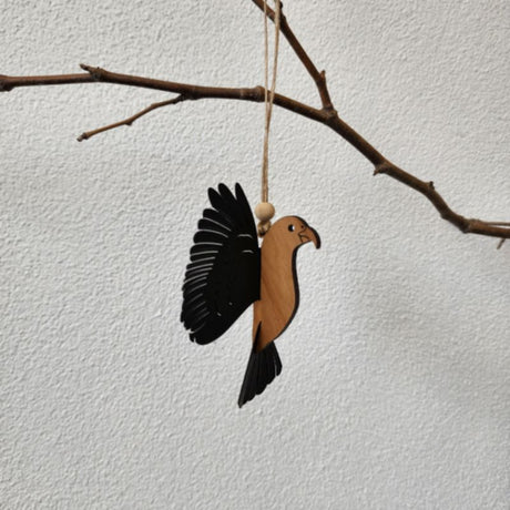 Beautiful Rimu Kea hanging ornament with laser-cut design and 3D wings, perfect for home decor and gifting.
