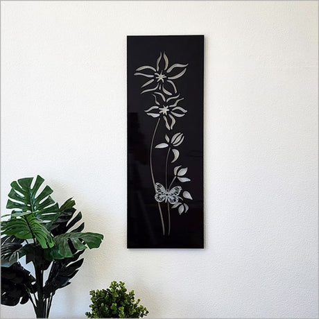 Large wall art featuring a black clematis and butterfly design, crafted from durable ACM, 79cm tall for indoor/outdoor use.
