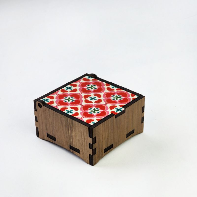 Square trinket box made from River Rimu, 8cm, showcasing unique texture and eco-friendly craftsmanship.