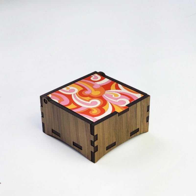 Elegant 8cm square trinket box crafted from River Rimu with unique koru design, perfect for jewelry and keepsakes.