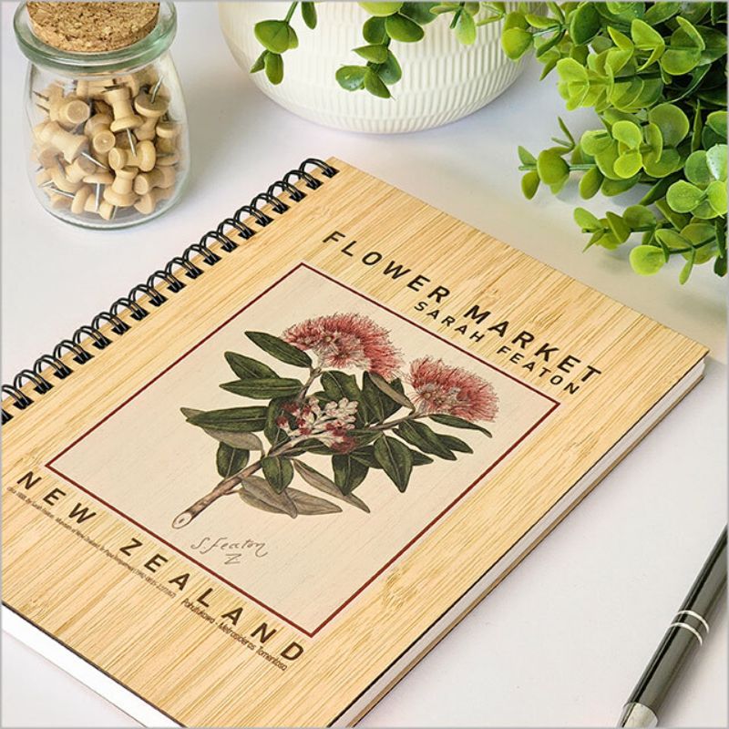 Eco-friendly Bamboo Journal featuring Pohutukawa design, 21cm, 110 pages of 110gsm cartridge paper, perfect for writing or sketching.