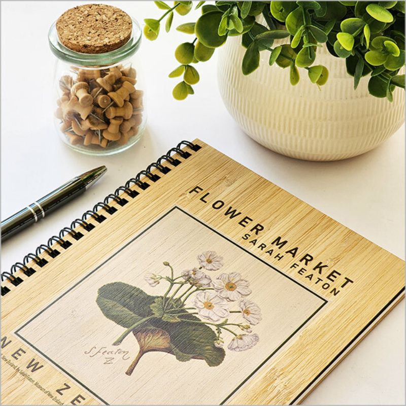 Elegant Bamboo Journal featuring Mountain Lily design, FSC certified, 110 pages of 110gsm paper, perfect for travel or sketches.