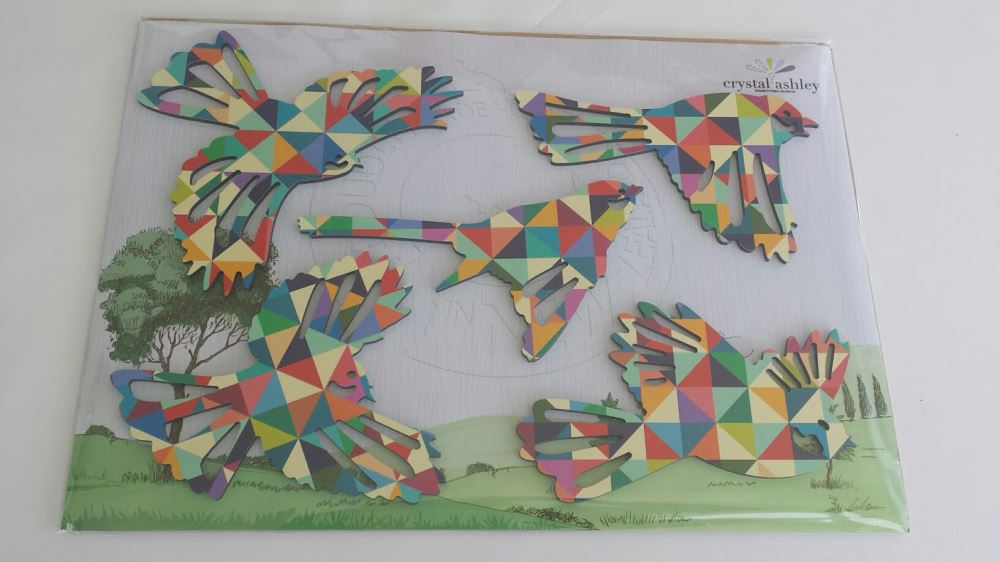 Geometric wall art featuring a flock of stylized fantails, perfect for enhancing any Kiwiana-themed decor.