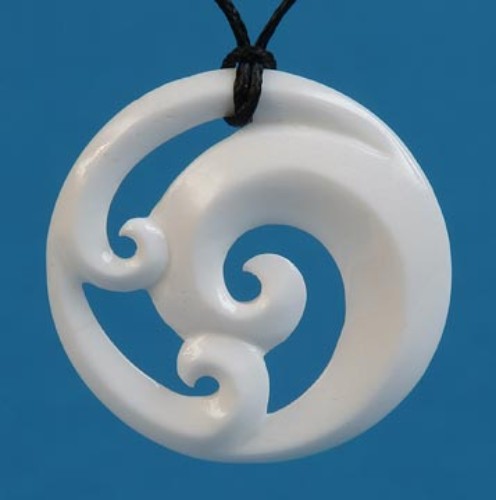 Handcrafted Bone Triple Koru Pendant featuring intricate fern frond carvings, symbolizing new beginnings and personal growth.