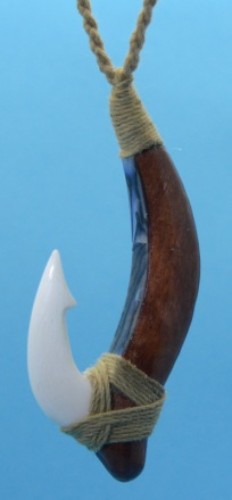 Handcrafted Old Style Fish Hook Pendant in bone, symbolizing luck and prosperity with adjustable cord for personalized wear.