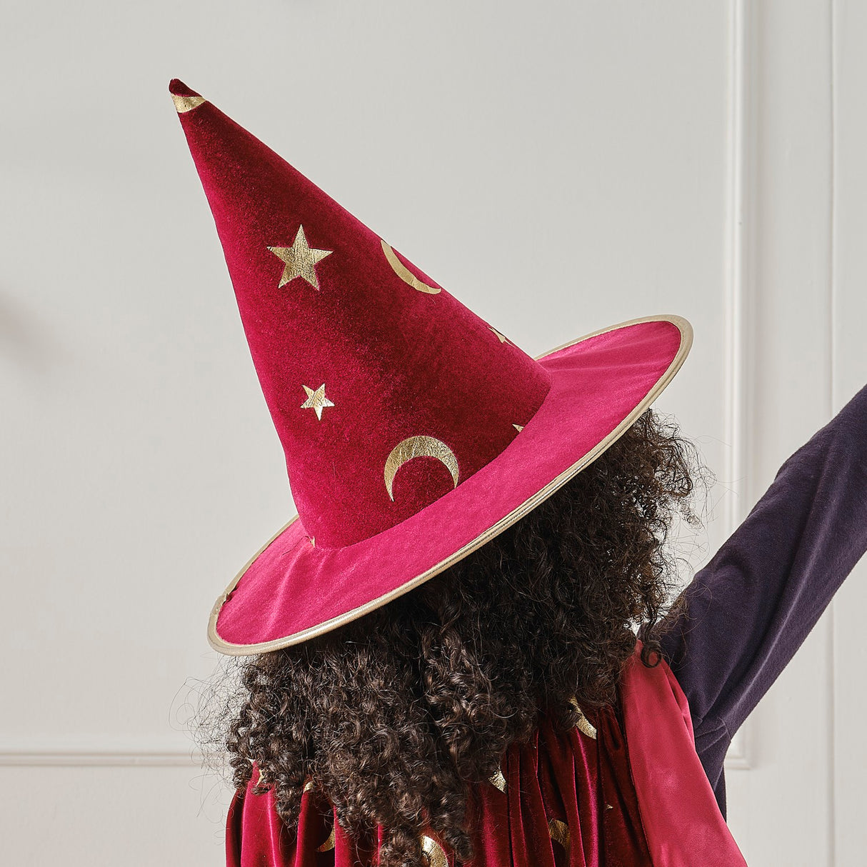 Burgundy velvet magician hat with gold stars, perfect for imaginative play and costume parties for kids.