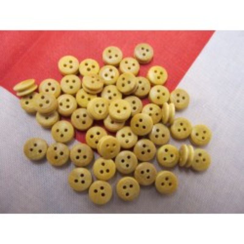 Set of 50 durable 7mm wooden dead eyes for rigging, essential for strong and secure sailing projects.