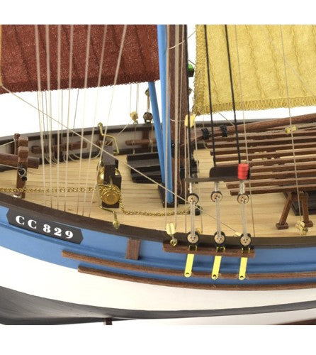1:50 scale wooden model of the French tuna fishing boat Marie Jeanne, featuring intricate parts and hand-sewn sails.