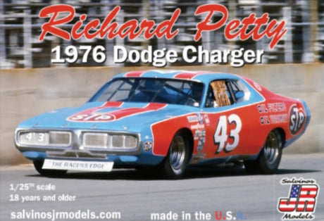 1/25 scale model kit of Richard Petty's 1976 Dodge Charger, featuring detailed parts and blue-yellow paint scheme.