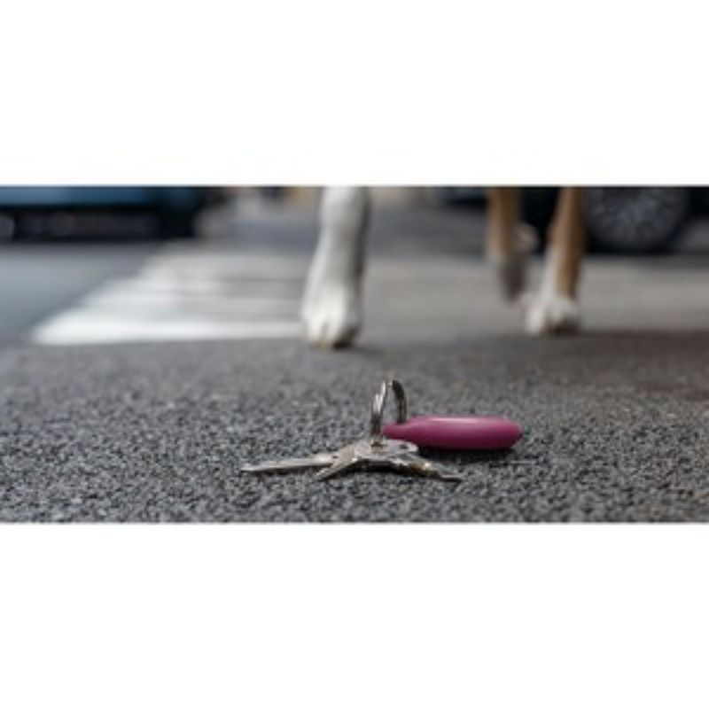 Belkin Pink AirTag holder with key ring, stylish and durable protection for securing valuables with a twist-and-lock design.