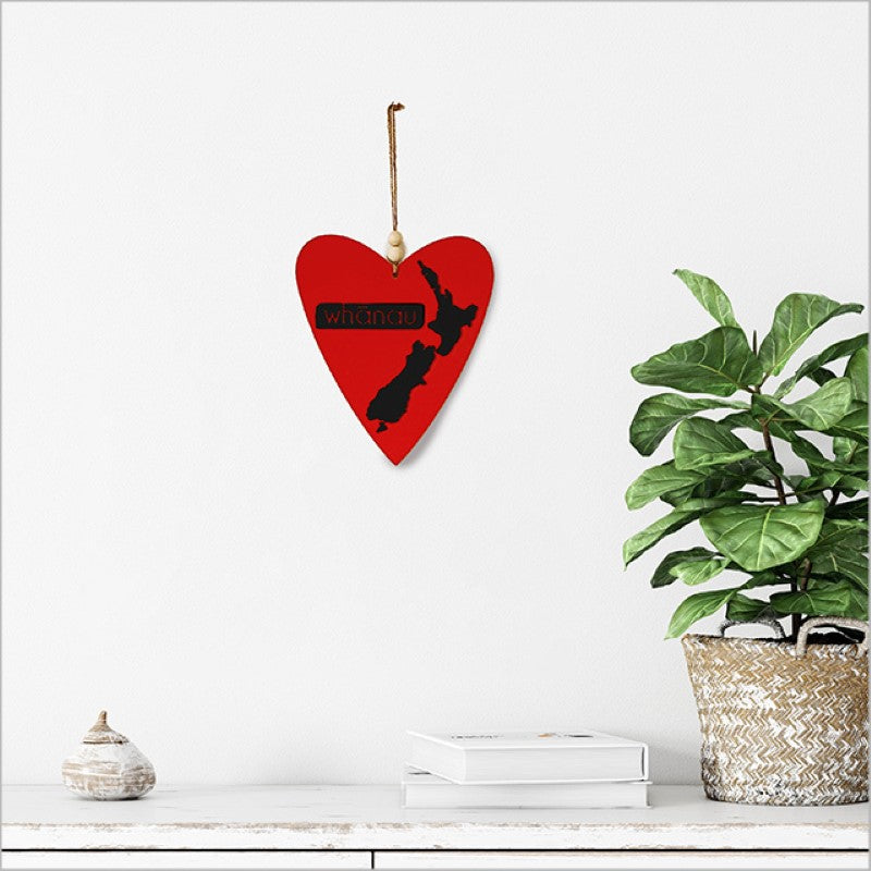 Heart-shaped Kiwiana wall art in black acrylic, measuring 230mm x 270mm, symbolizing family and love.