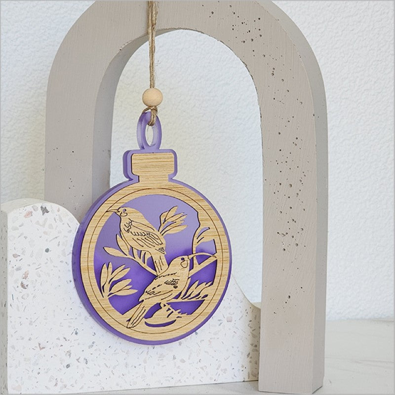 Purple Satin Acrylic Hanging Ornament featuring a Huia bird design, perfect for holiday decor or gifts.