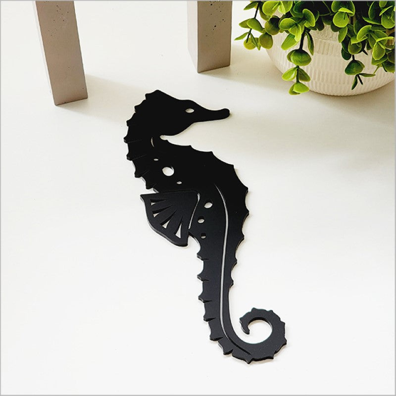Elegant Black Seahorse acrylic wall art (23.5cm) enhances home decor with marine-inspired aesthetics.