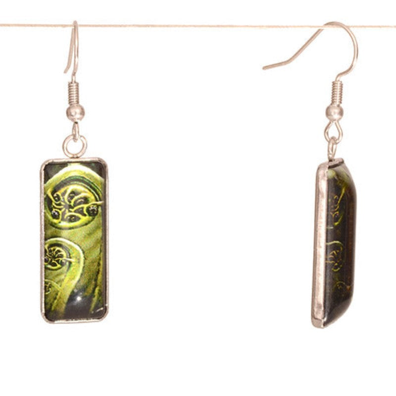 Green Koru Resin Rectangle Drop Earrings featuring an iridescent pattern, ideal for casual or formal wear.
