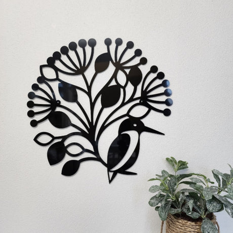 Large wall art featuring a kingfisher perched on pohutukawa blossoms, crafted from durable black aluminum composite material.