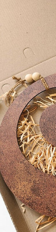 Rusted copper textured Koru wall art set, featuring intricate designs ideal for indoor and protected outdoor spaces.