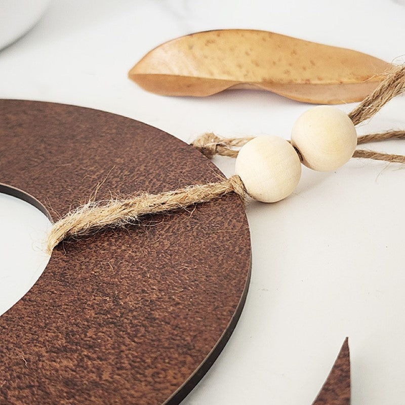 Rusted copper textured wall art featuring an intricate Koru design, 300mm diameter, perfect for indoor or covered outdoor spaces.