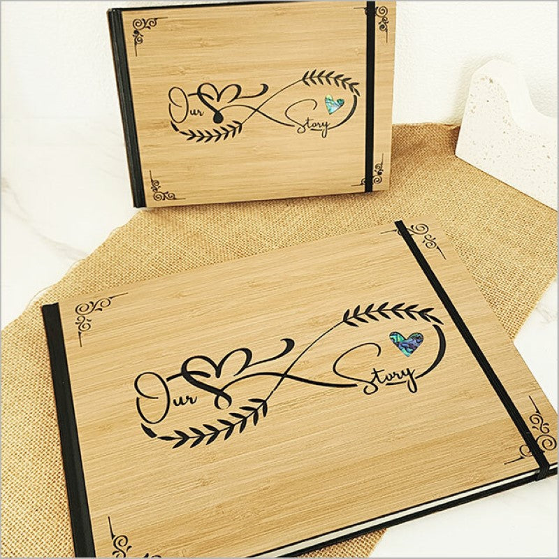 Large hardbound guest book made of laser-cut bamboo and NZ Paua, perfect for memories and messages.