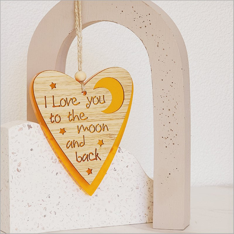 Vibrant orange heart and moon hanging ornament crafted from satin acrylic, perfect for home decor and gifting.