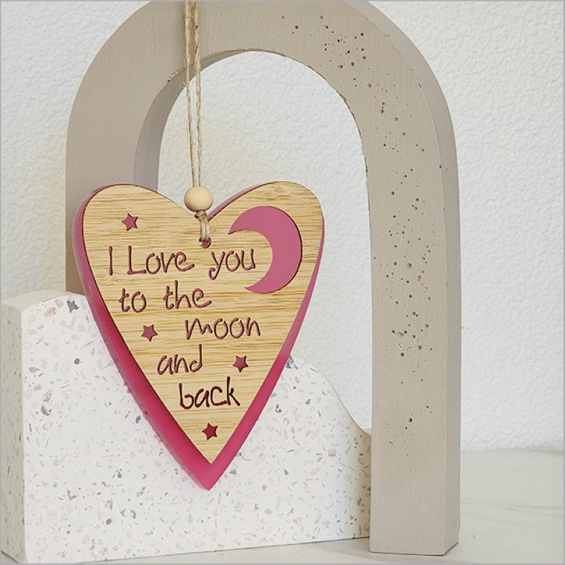 Pink satin acrylic heart and moon ornament, intricately designed, ready to hang, perfect gift for loved ones.