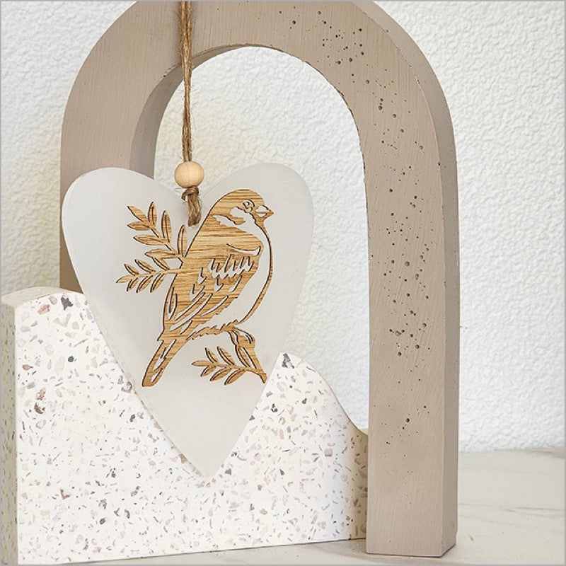 White satin acrylic heart ornament featuring sparrow design, perfect for elegant home decor and easy hanging.