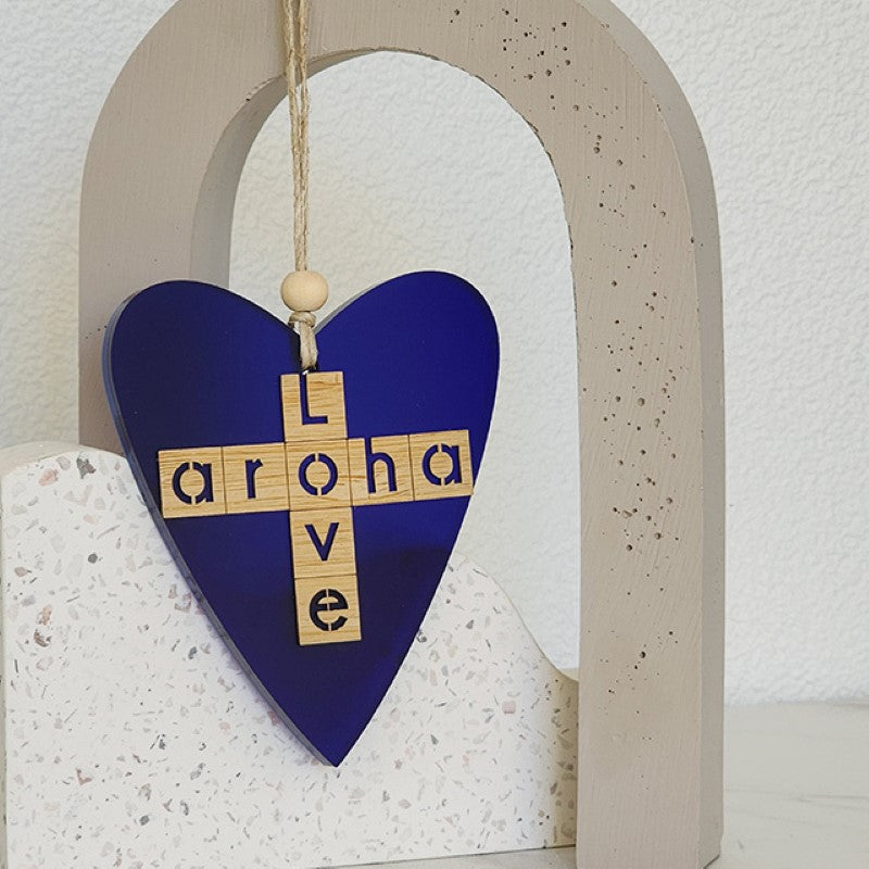 Blue satin acrylic heart ornament featuring Aroha and Love, perfect for home decor and meaningful gifts.
