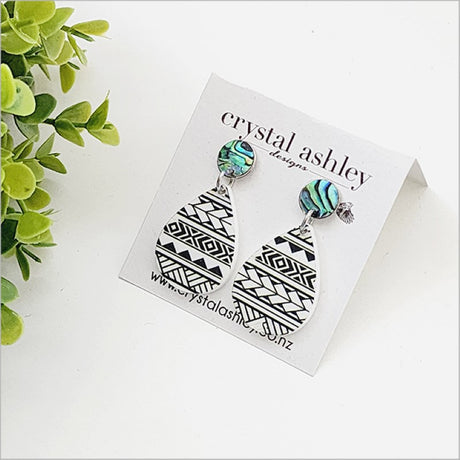 Teardrop black Patiki and Paua earrings set showcasing unique laser-cut design and vibrant shell patterns. Lightweight and elegant.