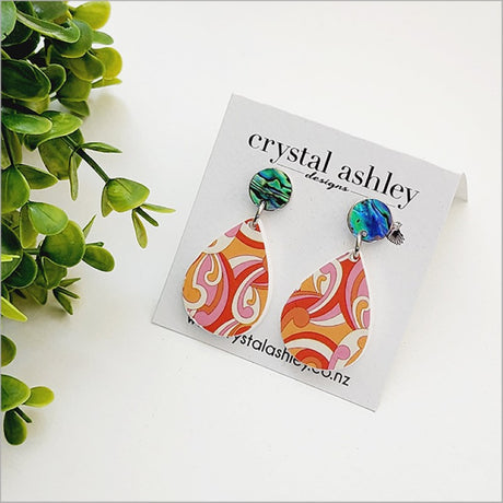 Lightweight teardrop earrings featuring unique Paua shell and acrylic, showcasing vibrant Kiwiana-inspired designs.