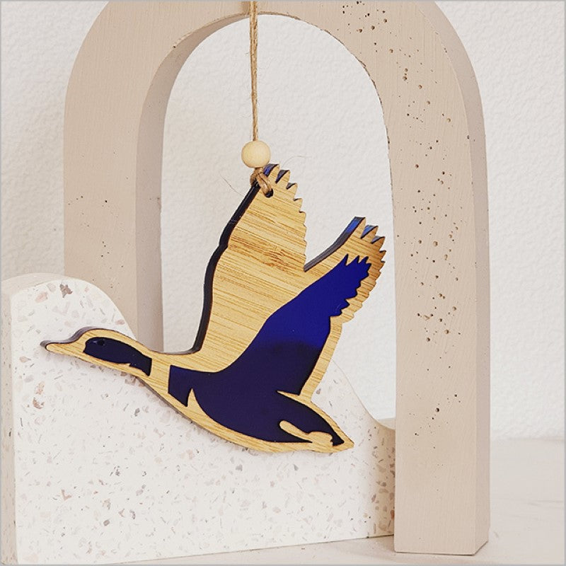 Vibrant blue satin acrylic duck ornament, ideal for decoration or gifting, 110mm x 90mm, crafted from laser-cut bamboo.
