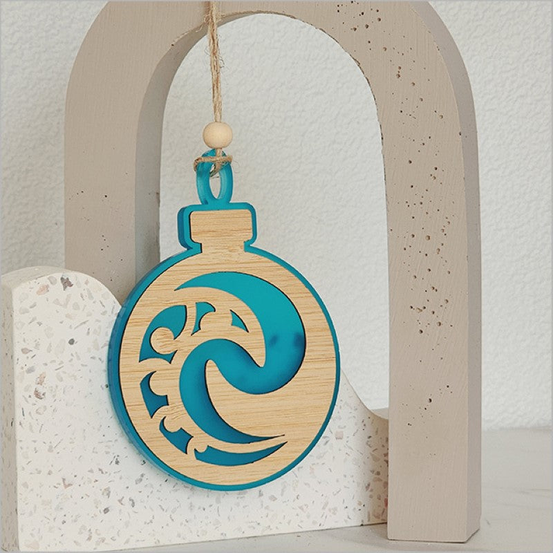 Teal satin acrylic Koru ornament, beautifully crafted for home decor or gifts, symbolizing new beginnings and harmony.