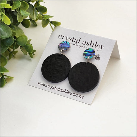 Lightweight drop dangle earrings featuring unique round black Wharare and vibrant Paua shells, perfect for any occasion.