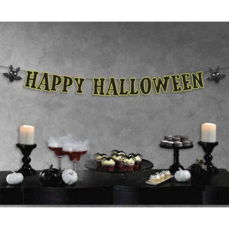 Colorful 'Happy Halloween' banner with playful bats, perfect for festive decorations and gatherings.