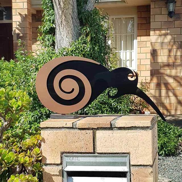 Freestanding 2 Tone Moko Kiwi art in Black & Brushed Copper, perfect for enhancing outdoor spaces with Kiwiana charm.