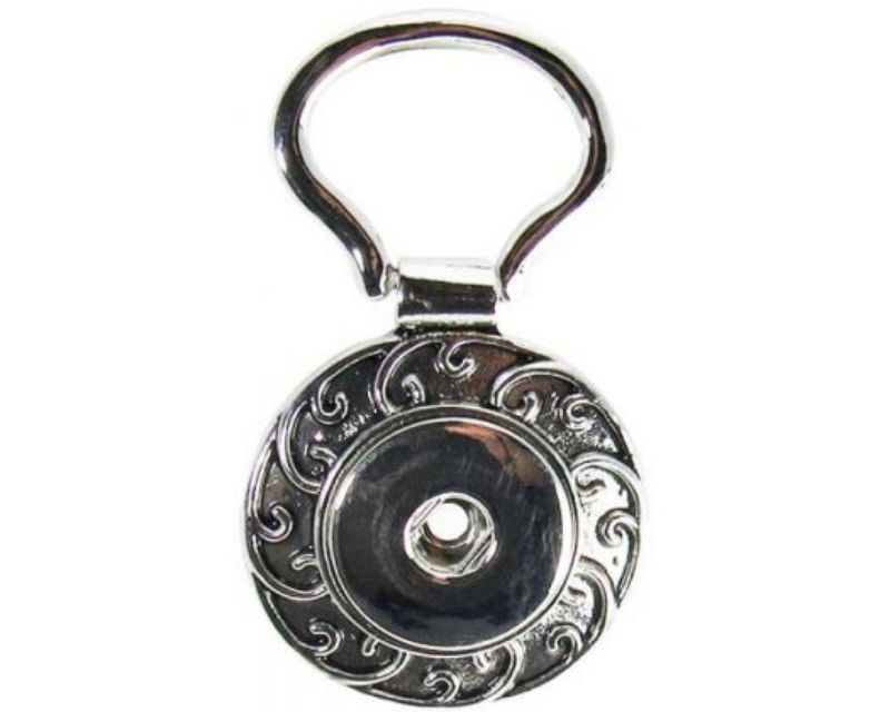 Vibrant Snaps REDFOX Key Ring Koru features a spiral koru design, 5x3 cm, perfect for stylish key organization.