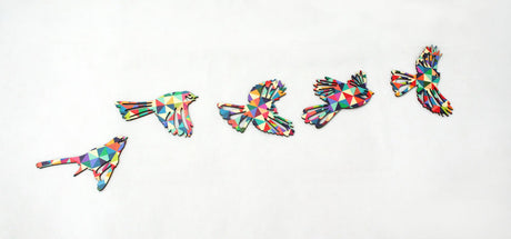 Geometric wall art featuring a flying flock of fantails, capturing New Zealand's essence in a modern design.