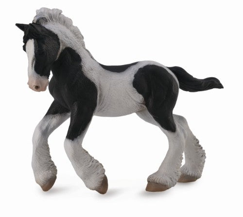 Medium-sized black and white piebald Gypsy foal figurine, showcasing intricate details and elegance for home decor.