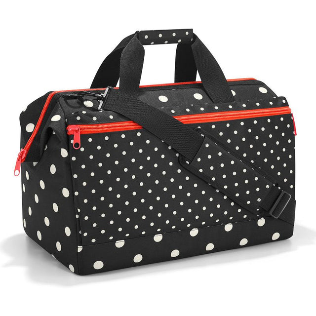 Spacious Reisenthel All Rounder L Pocket Bag in mixed dots, 32L, with large opening, multiple pockets, and padded handles.