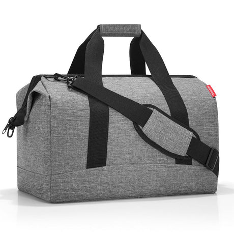 Stylish silver Reisenthel All Rounder L Bag, 48cm, 30L, doctor's bag design with padded walls, zip fastening, and six pockets.