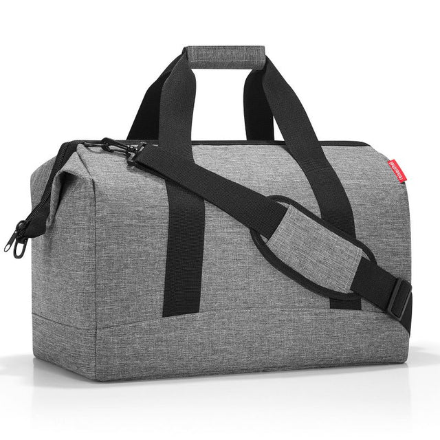 Stylish silver Reisenthel All Rounder L Bag, 48cm, 30L, doctor's bag design with padded walls, zip fastening, and six pockets.