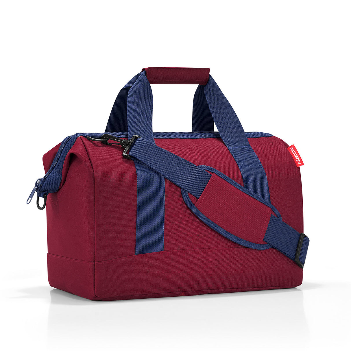 Versatile Reisenthel All Rounder M Bag in Dark Ruby, featuring sturdy zip, padded strap, and six pockets for organized storage.