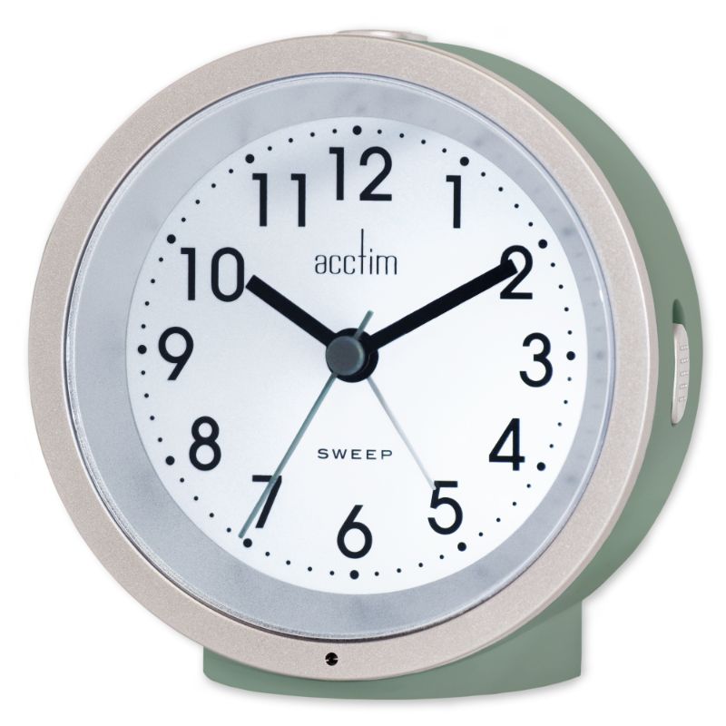 Elegant moss green analog alarm clock with illuminated Arabic dial and non-ticking sweep second hand.